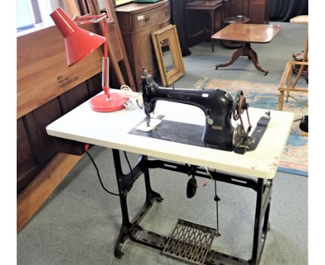 AN INDUSTRIAL SINGER SEWING MACHINE with treadle base (fitted an Allbook and Hashfield motor) and an anglepoise style lamp (3