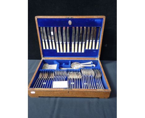 A MAPPIN &amp; WEBB OAK-CASED CANTEEN 8 settings, with patent action to the lid (some items missing, but with matched extras,