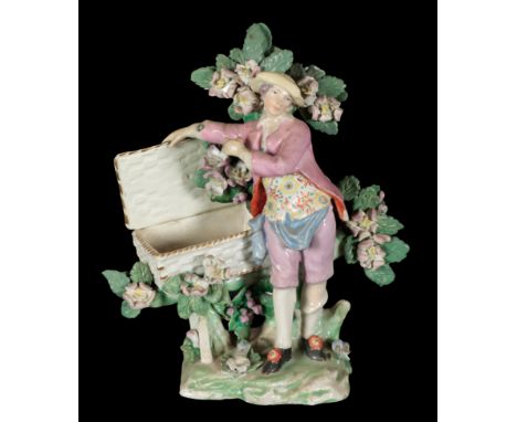 AN 18TH CENTURY DUESBURY &amp; CO DERBY PORCELAIN FIGURE - 'THE MAP SELLER' ground base, 18cm high; together with an 18th Cen