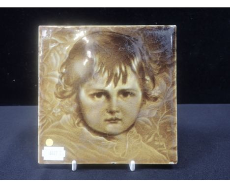 A POOLE PORTRAIT TILE OF EVELYN SHEPARD olive glaze