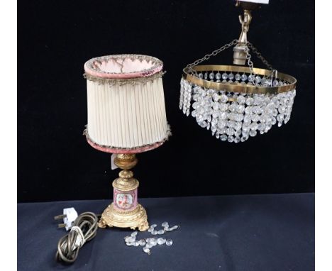 A FRENCH ORMOLU AND PORCELAIN LAMP and a small three-tier chandelier (for re-wiring)