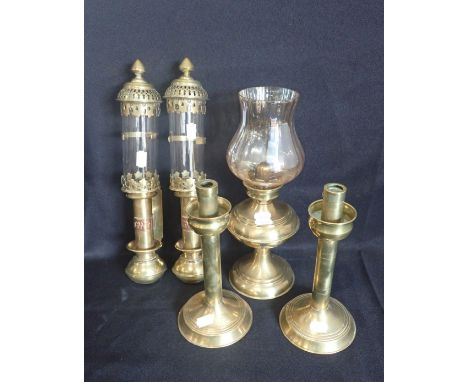 A PAIR OF BRASS 'GWR' CARRIAGE LAMPS with embossed copper plaques, each 35cm high, a small brass oil lamp and a pair of brass