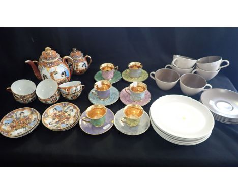 A JAPANESE PART TEA SERVICE, WITH 'GEISHA ' BASE CUPS comprising teapot, milk jug and sugar pot, six cups and saucers, togeth