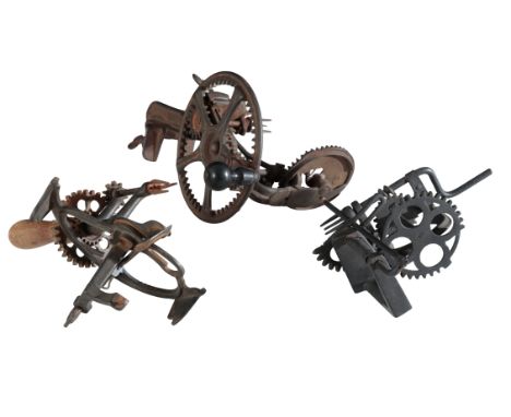 THREE APPLE PEELERS including an arc-action parer 'Lightning', marked 'Patented Oct 6 1863', 26cm high, together with a retur