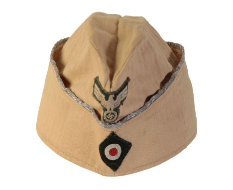 A WWII GERMAN OFFICERS SIDE CAP&nbsp;with army eagle insignia, silver bullion piping, leather sweat band stamped "59"