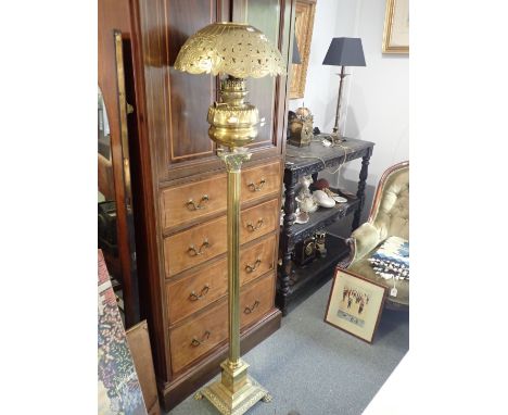A 19TH CENTURY FRENCH BRASS COLUMN STANDARD OIL LAMP with pierced brass shade