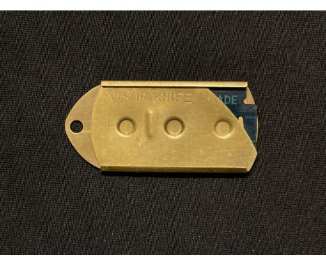WW2 British / US "Visor Knife" escape and evasion blade, a brass scabbard designed to carry a razor blade which could be worn