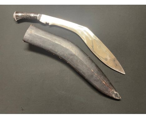 Gurkha Kukri knife with large 44cm long single edged bright steel blade. Punch marked decoration to one side of blade. Decora