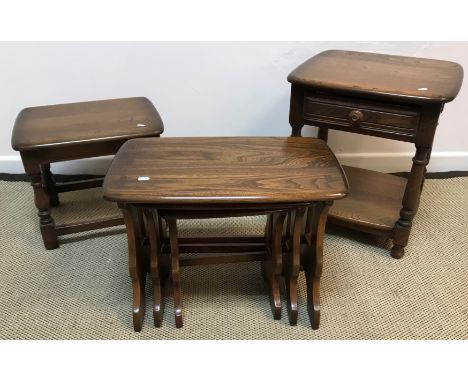 An Ercol elm nest of tables, 57 cm x 35.5 cm x 42 cm high (largest), 34 cm x 25.5 cm x 36.5 cm high (smallest), an Ercol elm 