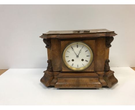 A 19th Century burr walnut cased mantel clock, the French movement stamped verso "JBD" and bearing label to door inscribed "F