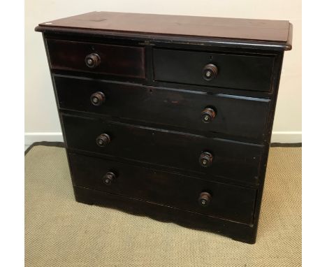 A Victorian mahogany veneered chest of two short and three long graduated drawers with ebonised and mother of pearl inlaid ha
