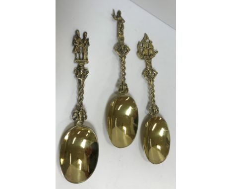 A set of three Victorian silver gilt spoons in the 18th Century German taste with figural / ship decoration to the pierced ha