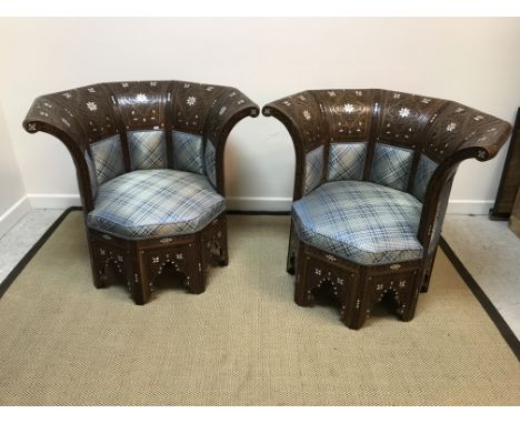 A pair of modern Middle Eastern teak and mother of pearl inlaid chairs, the five-section panelled and floral-decorated backs 