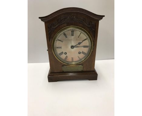 A circa 1900 mahogany cased mantel clock, the eight day movement with silvered dial and Roman numerals , 28 cm high