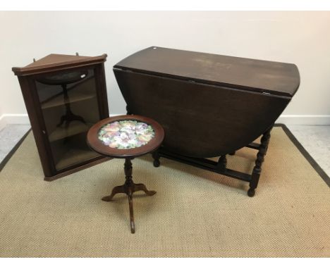 A Victorian rosewood and cross-banded octagonal centre table on turned legs united by an undertier, raised on china castors, 
