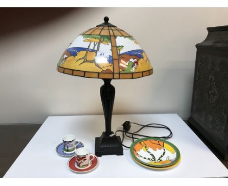 A set of eight Wedgwood limited edition Clarice Cliff 'Cafe Chic' collection coffee cans and saucers together with a set of e