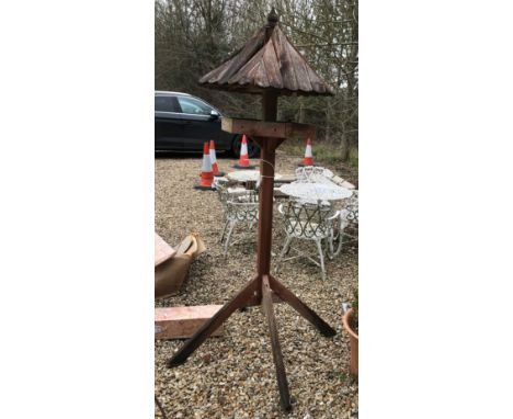 A collection of five matching terracotta garden planters with box bush contents, approx 43 cm diameter x 34 cm high, a recons