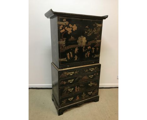 A 20th Century green lacquered and chinoiserie decorated cocktail cabinet in the Georgian style, the upper section with two c