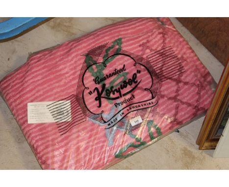 A Vintage "Kosywol" Lancashire candlewick bedspread, approximately 90 cm x 90 cm in original plastic wraps. CONDITION REPORT: