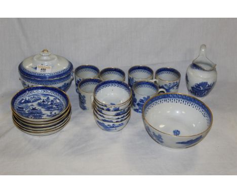 A group of 19th century blue and white chinoiserie design tea wares, comprising a milk jug, a sucriere, a slop bowl, 3 saucer
