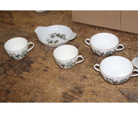 An extensive Royal Worcester fine bone china Lavina pattern tea and dinner set, decorated with fruit brambles and moulded wit