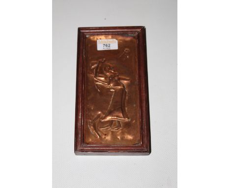 A small embossed copper rectangular plaque, probably African, depicting A lady wielding an axe, in wood frame, 22 cm x 12 cm.