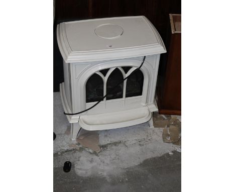 A large enamelled cast iron electric stove of traditional form, the rectangular bowed top with central circular aperture and 