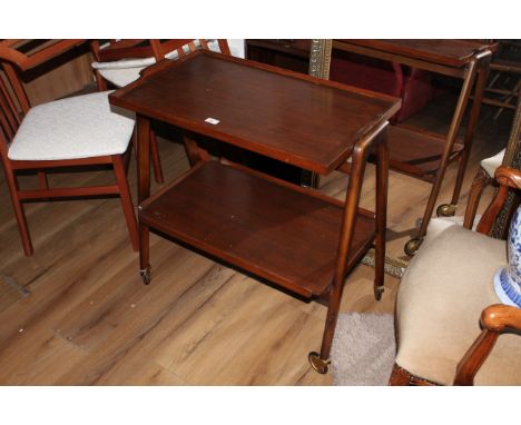 A vintage hardwood tea trolley with removable tray top section and under tier, 74 x 71.5 x 40 cm. CONDITION REPORT: Generally