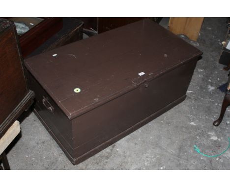 A 19th century brown painted 2 handled trunk with wallpapered interior, 102 cm x 54 cm x 45 cm. CONDITION REPORT: This trunk 
