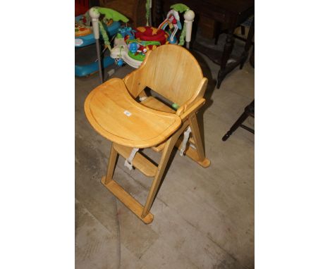 A child's light wood high chair, 105 cm high and a beech wood laminate side chair. CONDITION REPORT: Both chairs have some us
