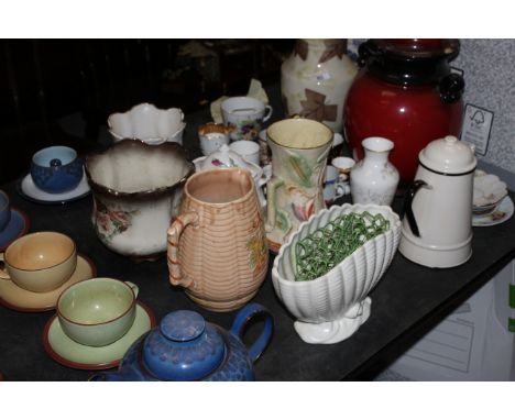 A Radford pottery vase decorated with leaves, a Denby stoneware Harlequin tea service comprising teapot and three cups and sa