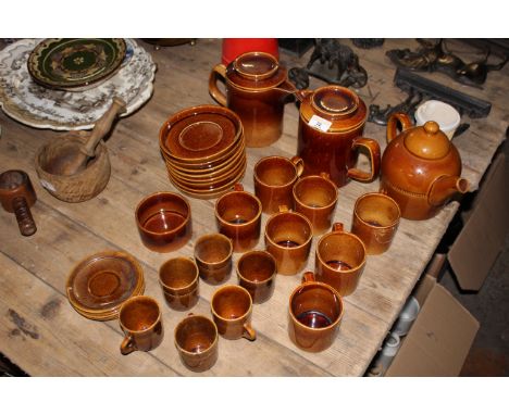 A Hoganas Swedish brown glazed stoneware part tea/coffee service comprising teapot, 6 coffee cups and 6 saucers all with bead