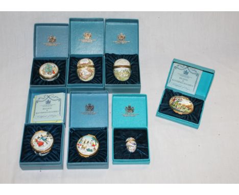 A group of 8 Bilston &amp; Battersea enamelled boxes two in the form of an egg each with various designs including Christmas,