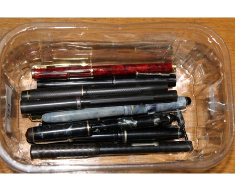 A collection of vintage fountain pens, to include an Osmiroid 65 fountain pen, a Waterman's, a Conway Stuart 12 green fountai