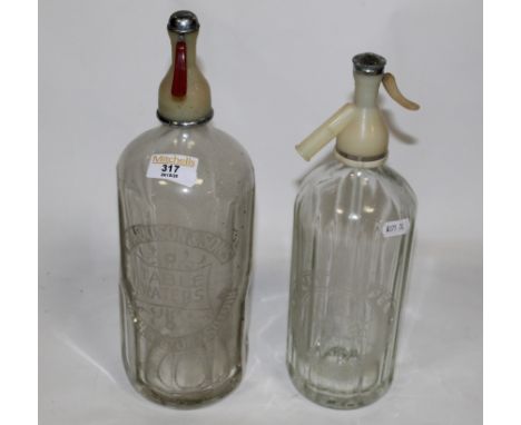 A vintage Arnison &amp; Son of Penrith, Wigton, and Silloth table waters soda siphon of fluted form, together with a vintage 