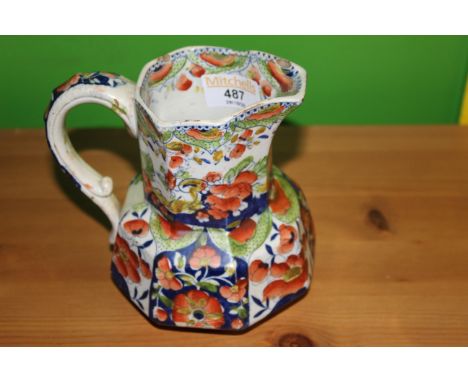 A Victorian M &amp; N new opaque hydra jug decorated with an Imari style design, 14 cm high. CONDITION REPORT: Some minor chi