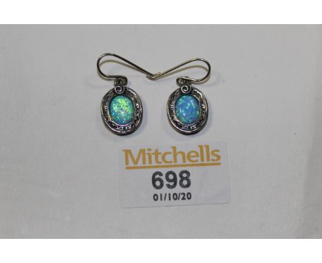 A pair of Israeli 925 silver and opal doublets, oval earrings (for pierced ears)  CONDITION REPORT: These earrings are in goo