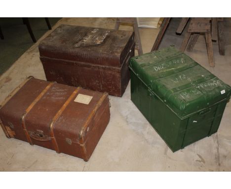 Two late Victorian metal travel trunks and two canvas covered travelling trunks. CONDITION REPORT: Metal trunks are dented. T