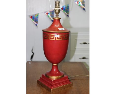 A modern red painted urn formed table lamp, decorated with gilt highlights and Greek key band to body, 49 cm high. CONDITION 