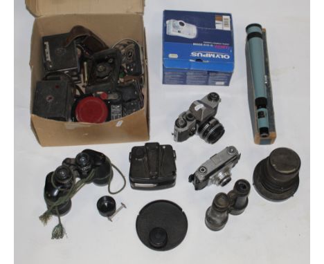 A Pratika super TL camera body and lens, an Ilford's sportsman camera, a pair of 19th century field glasses and a selection o