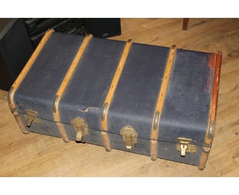 A ribbed travel trunk with blue canvas covering and bentwood ribs, 31 x 90 x 51 cm. CONDITION REPORT: Some cracks showing to 