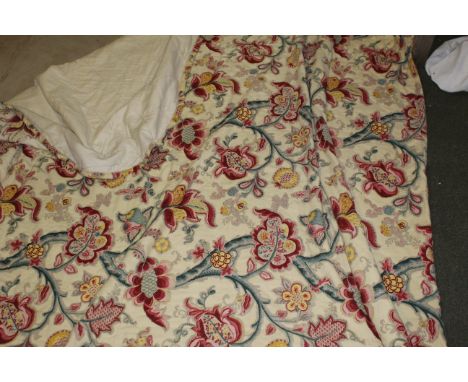 A Vintage machine stitched quilt, using a William Morris inspired fabric with rounded bottom corners and quilted with the har