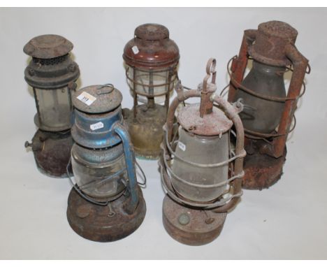 A group of 5 vintage tilly lamps. CONDITION REPORT: Corrosion throughout with paint losses and accumulated dirt. 