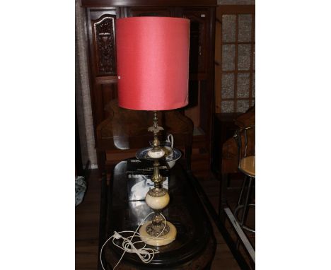 A gilt metal and alabaster table lamp of large proportions, 78 cm to fitting. CONDITION REPORT: Some discolouration to the al