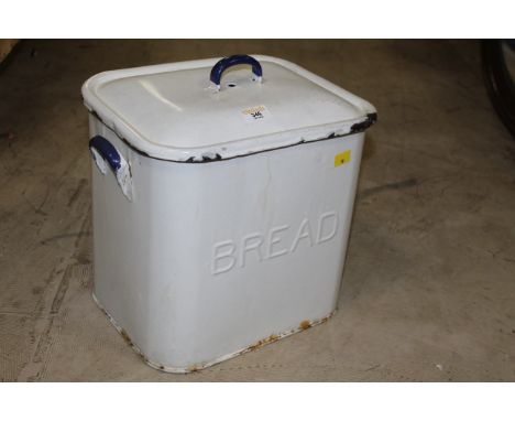 A vintage mid century enamelled bread bin of traditional form, 35 cm x 35  cm x 27 cm. CONDITION REPORT: Some chipping to the