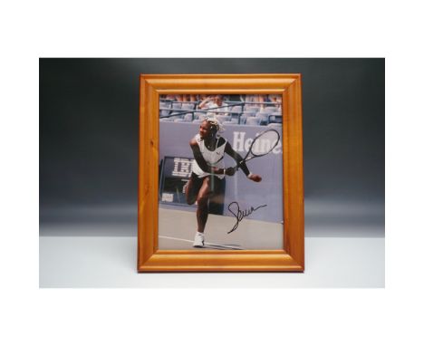 Framed action photograph of Serena Williams competing at the 1998 US Open, where she defeated Nicole Pratt. The image capture