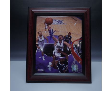 This framed and autographed Peja Stojakovic photo captures the three-time NBA All-Star in action during his tenure with the S