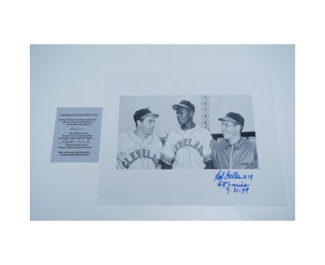 A black-and-white photograph featuring Cleveland baseball legends, autographed by Hall of Fame pitcher Bob Feller in bold blu