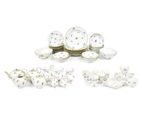 A Meissen Porcelain Tea and Coffee Service, late 19th/early 20th century, painted with scattered flowersprays within gilt lin