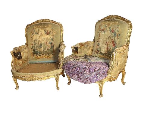 A Pair of French Louis XV-Style Carved Giltwood Bergeres, late 19th century, with part Aubusson tapestry covers, the moulded 